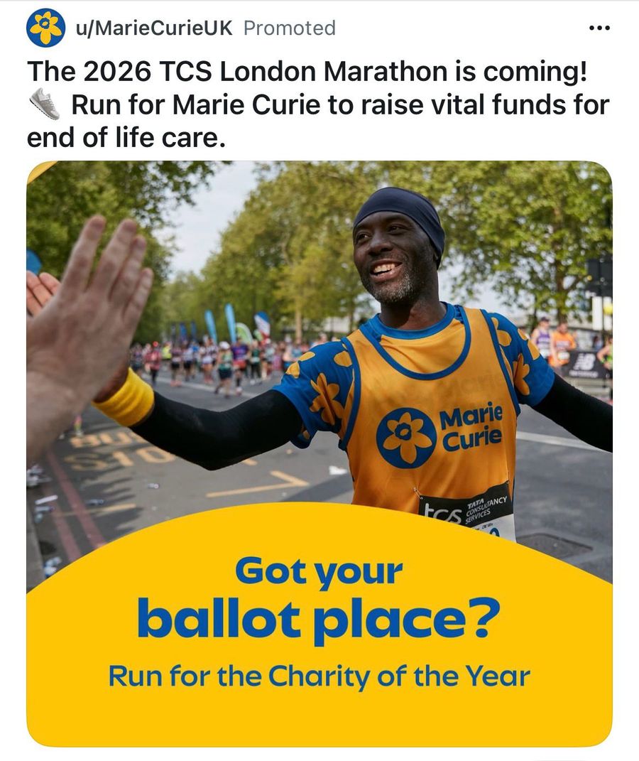 Marie Curie Charity-of-the-Year 2026 promoted Reddit advertisement featuring Serge Nguélé as the lead campaign image, with the caption 'The 2026 TCS London Marathon is coming'